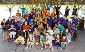 Campers invite physically and intellectually handicapped kids to participate in a day camp
